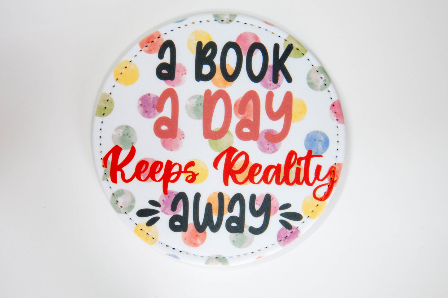 A Book A Day Keeps Reality Away